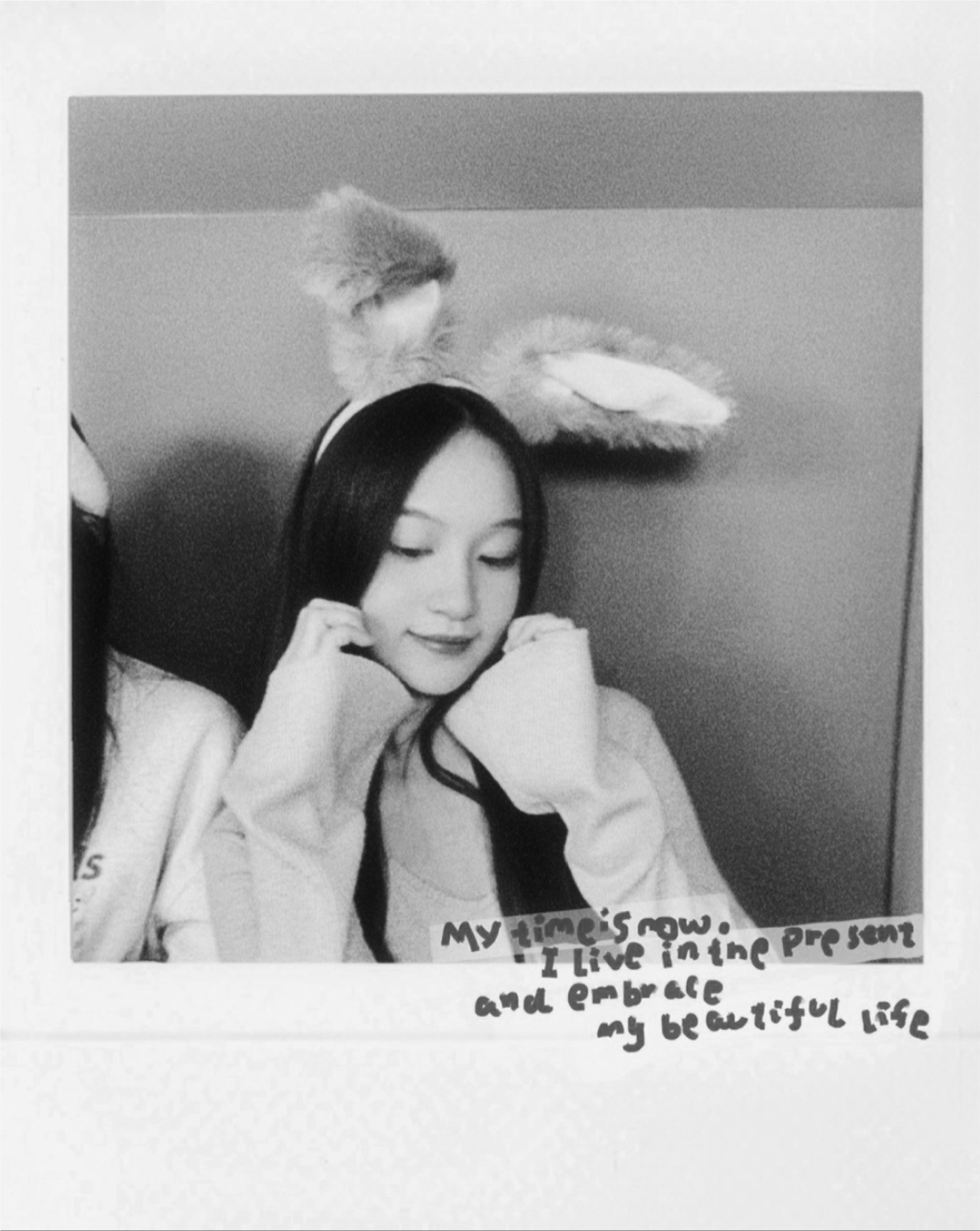 Katrina in a monochrome photo-booth portrait